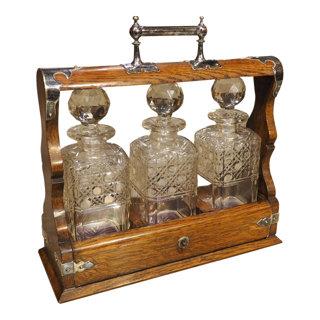 19th Century 3-Bottle English Oak and Silver Plated Locking Decanter Set For Sale