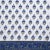 The Blossom design illustrates a traditional Indian flower motif set against a scrolling floral border for a beautiful...