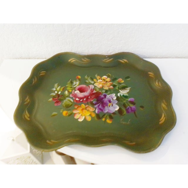 Lovely, mid-century, generous size, dark Olive Green metal tray featuring a beautiful, hand-painted floral motif in...