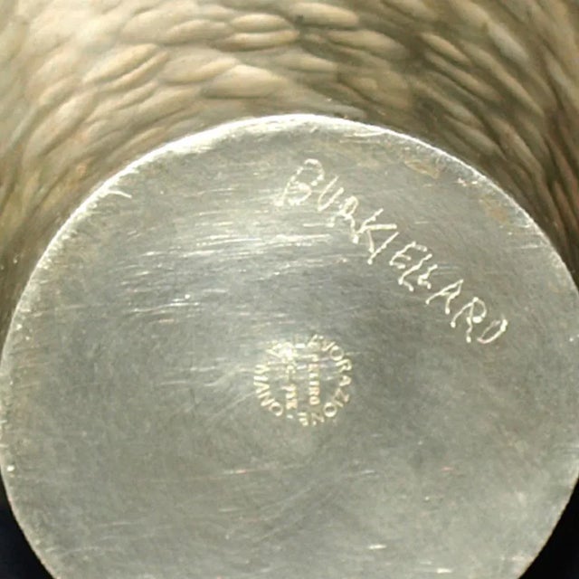 There is a signature under the base.