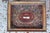 Large reliquary frame in colored paper filigree, with gilded edges, containing relics of Saint Benignus [of Dijon] and...