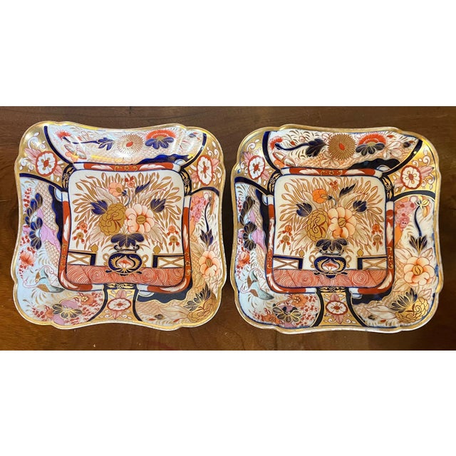 Pair early 19th century Coalport porcelain square dishes decorated in an imari palette, circa 1805. Measure 10 1/4" corner...
