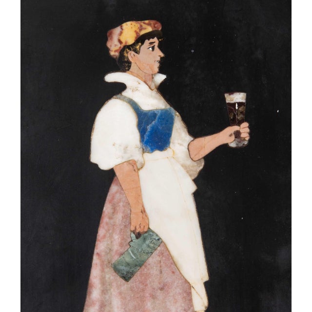 A well executed pair of mid 19th century italian pietra dura panels, a colourful choose of marbles depicting a gallant and...