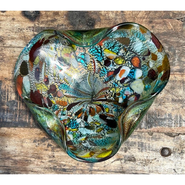This vibrant vintage Italian art glass bowl, crafted in the spirit of Murano’s legendary glassmakers, is a spectacular...