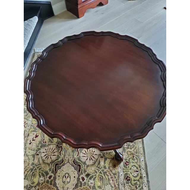 Striking Henkel Harris mahogany pie crust table. Masterfully crafted in the classic Chippendale style, this piece features...