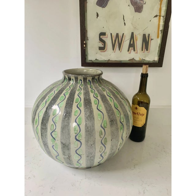 Large, round ceramic vase from Alsace, France. A riff on the Jaspé style of ceramic, but big and bold. In good condition....
