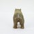 A fine, antique cabinet sized sculpture of a bear. In gilt bronze. Modeled naively with the bear standing on all four...