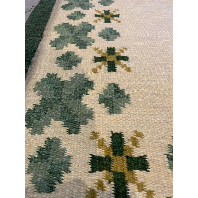 Cream Swedish Flat Weave Rug in Soft Green Tones on Cream Background For Sale - Image 8 of 9