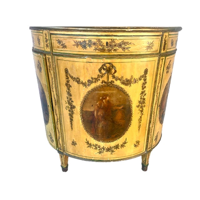 Elegant George III Painted Demilune Cabinet with Classical scenes. The shaped and painted form features neoclassical...