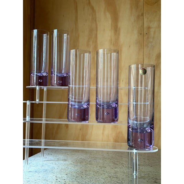 An exceptional and highly collectible set of 5 Mid-Century Modern highball or Collins glasses, masterfully produced in...