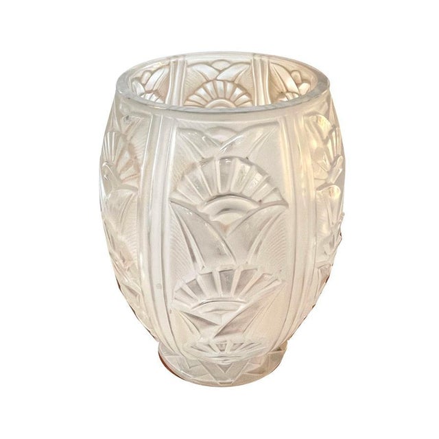 Large bulbous Art Deco glass vase France around 1930. Rose-colored glass with geometric cut flower decoration. Standing on...