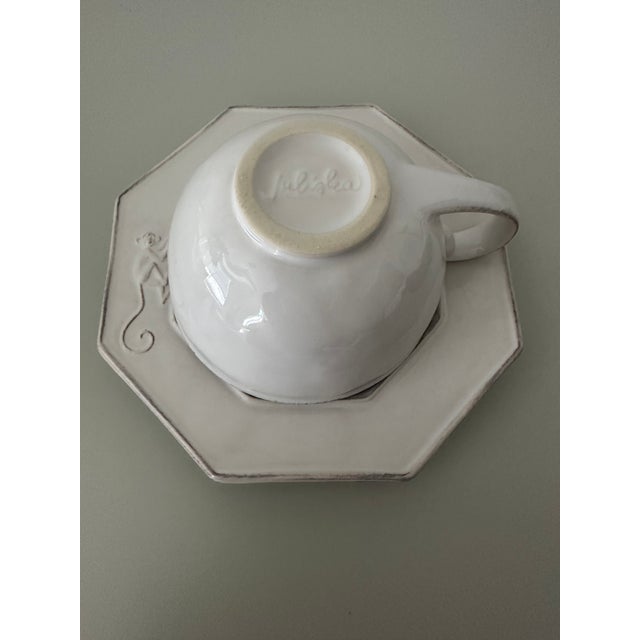 Set of 2 Juliska Petit Singe teacups and saucers. A discontinued pattern since the mid-2010s, this is a great set to have...