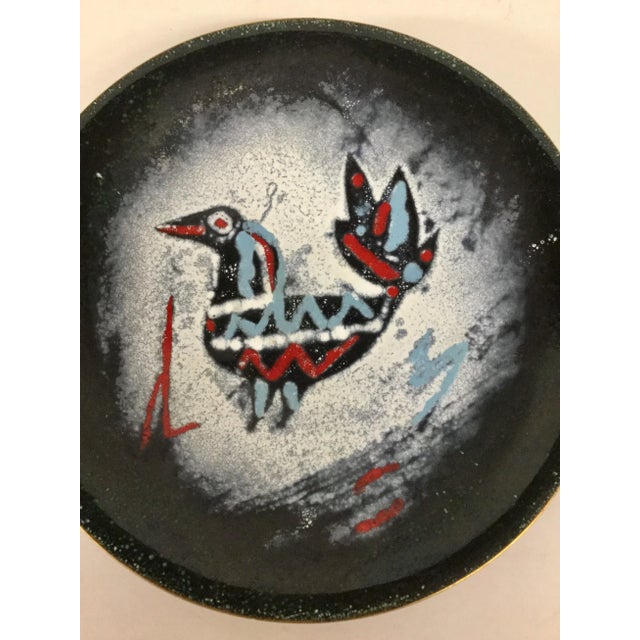 In perfect condition except some superficial surface scratches on the bottom. Works such as this one are hard to find...