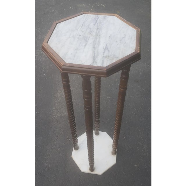 Vintage Octogonal Marble and Walnut Bobbin Turned Legs Stand. White marble top and base. Antique walnut boobin Turned...