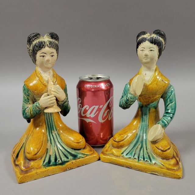 Pair of Chinese sancai-glazed seated female musicians. Made to look old, these are mid-20th century replicas of Tang...
