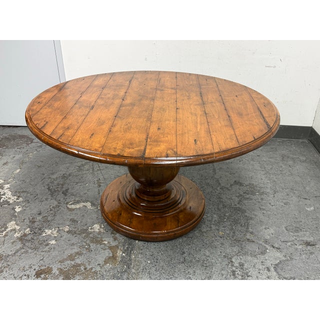 Design Plus Gallery presents a Hanover Extension Pedestal Table from Guy Chaddock. Crafted solid wood, this table...