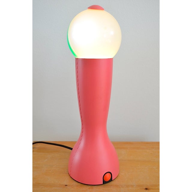 Table lamp from 1993, designed by Italian Silvia Capponi for Artemide. - The lamp emits a warm light. - The light can be...