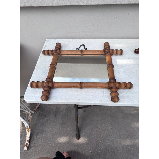 Small French faux bamboo wood mirror, circa 1900. Height 17.5 inches, depth 14.5 inches.