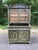 A striking antique two-piece painted pine hutch cabinet featuring classic Gustavian and Scandinavian provincial...