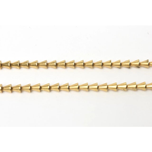 This is part of Chairish’s Costume Jewelry assortment. This very chic and au courant signed vintage Napier long necklace...