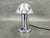 Elegant bauhaus table lamp from 1930s czechoslovakia. Crafted in chrome plated metal, this lamp features a clean...