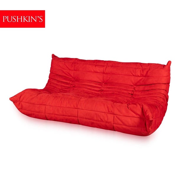 The iconic "Togo" sofa, originally designed by Michel Ducaroy for Ligne Roset in 1973, has become a design mid-century...