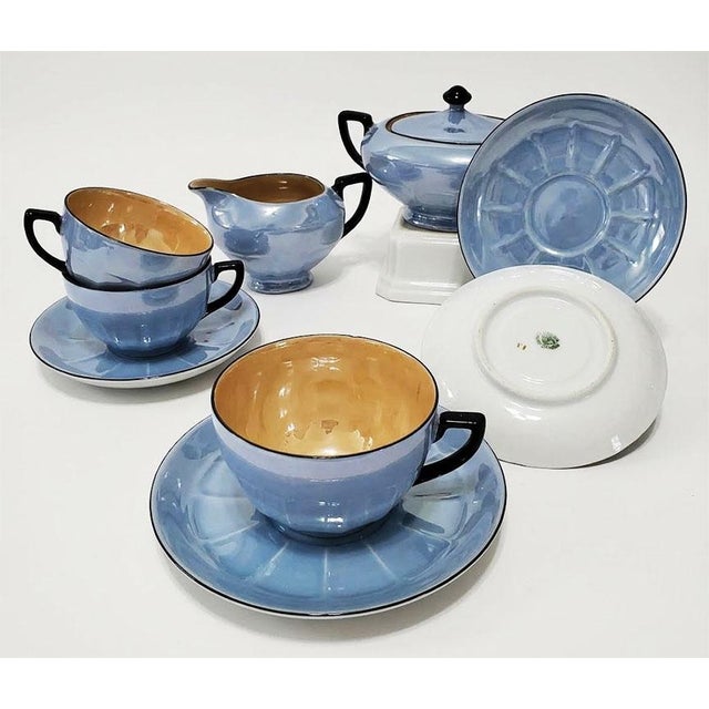 A striking, highly collectible 1930s Art Deco tea and coffee service manufactured by the renowned Porzellanfabrik Victoria...