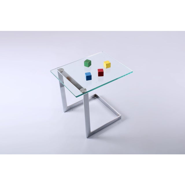 Cutting edge chrome plated iron sidetable in Bauhaus tradition but with postmodern hallmarks. Made by Gebra Germany in the...