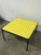 Table with Yellow Formica Top and Metal Legs from Cerutti, 1960, in Very Good conditions. Designed 1960 to 1969 This piece...