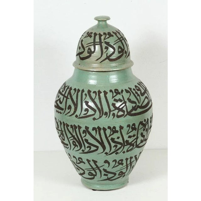 Large green Moorish ceramic Urns chiseled with Arabic calligraphy poetry writing. Handcrafted vases from Fez Morocco...