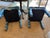 A lovely pair of fully upholstered Parsons-style ottomans in a slate blue chinoiserie fabric featuring cranes, flowering...