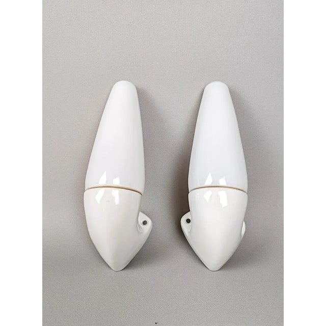 Mid Century Keramik wall lamp by Sigvard Bernadotte for IFÖ. The lamps are made of white ceramic with opal glass. I have...