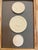 Immerse yourself in the enduring allure of classical antiquity with this truly unique collection of framed intaglios....