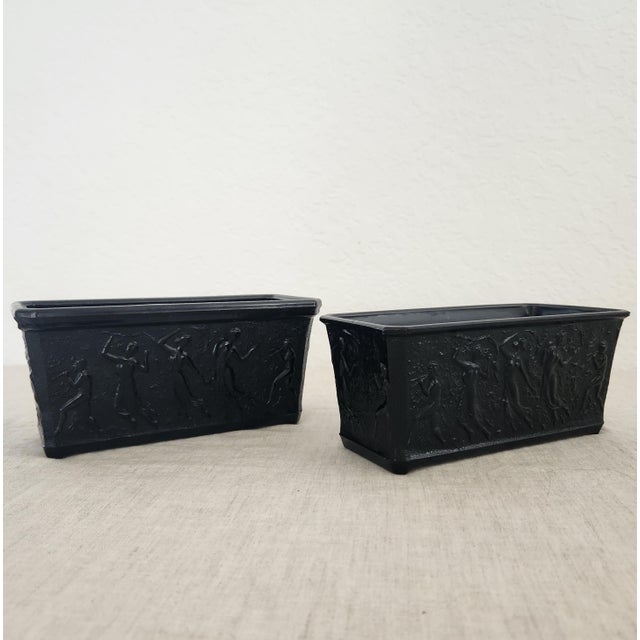 A stunning pair of vintage jardinieres by LL Smith Co. The vessels are hand made and constructed of heavy black amethyst...