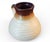 This is a great looking vintage ribbed stoneware art pottery pitcher. Brown glaze to cream ribbed body with single handle....