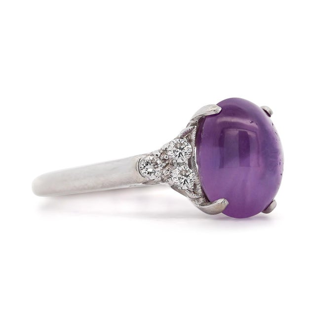 14K white gold ring is set with a GIA certified natural pink star sapphire from Sri Lanka, no heat treatment, displaying...