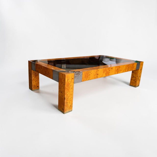 Burl & Smoke Glass Coffee Table With Chrome Trim in the Style of Milo Baughman Capture the peak of 1970s modernist glamour...