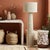 The Tapered Natural Chenille Fiber Floor Lamp brings a soft, grounded presence to the room. Wrapped in plush chenille...