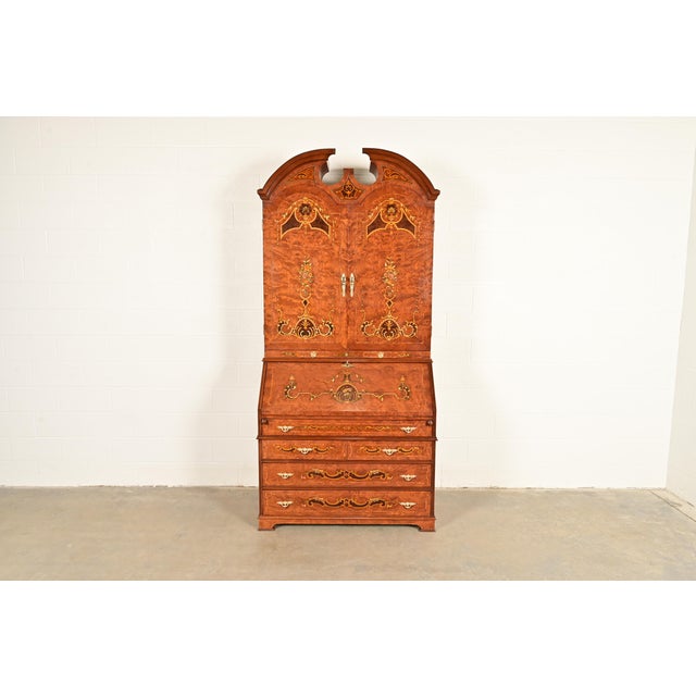 An outstanding Georgian, Chippendale, or Neoclassical style bureau with drop front secretary desk and bookcase hutch top...