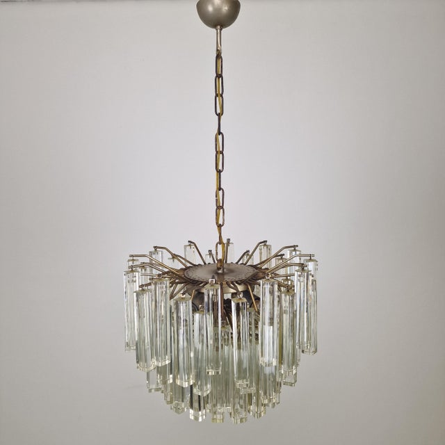 An exceptional and fully authentic mid-century modern italian murano glass chandelier, designed and manufactured by the...