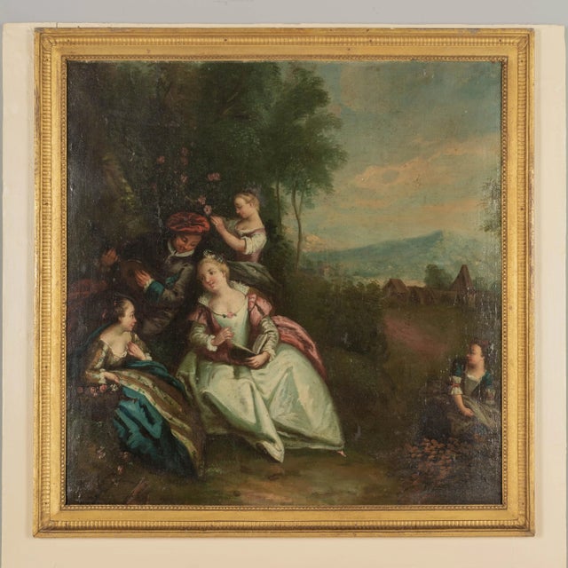 An early 19th century French Louis XV style trumeau mirror with a fine oil painting depicting a pastoral courtship scene....