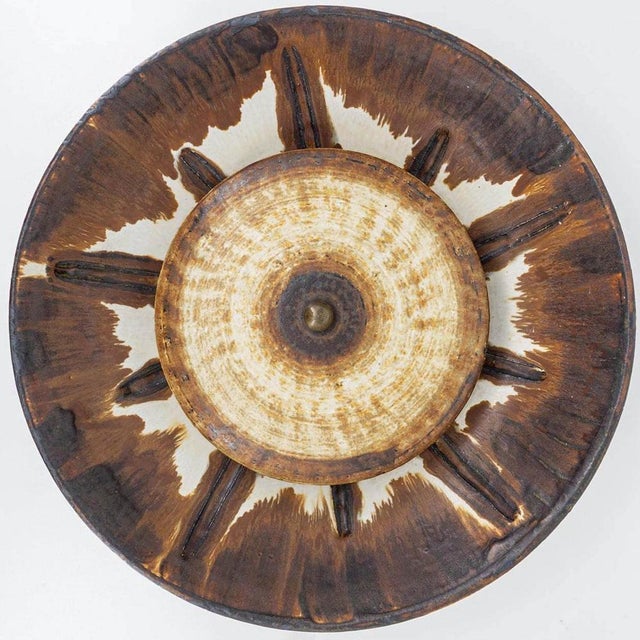 Spectacular circular ceramic wall light, with beautiful accents. Manufactured in denmark in the 1970s. In excellent...