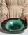 This 1960s serving bowl from France is finished in teal, worked in ceramic. Its form follows honest, well-proportioned...