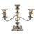 A regal pair of English silverplated candelabras dating to the early 20th Century by Baker Ellis Silver Co. Featuring the...