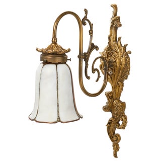 Antique Brass Wall Sconce With Slag Glass Shade and Ornate Scroll Arm For Sale
