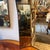 This elegant 1950s Italian Mid-Century Modern wall mirror features a refined rectangular silhouette heavily attributed to...