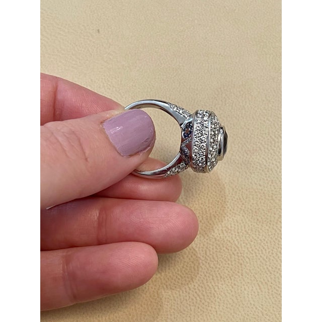 Approximately 4-5 Carat Ceylon Blue Sapphire & Diamond 18 Karat White Gold Cocktail Ring 4-5 Carat of blue Sapphire. This...