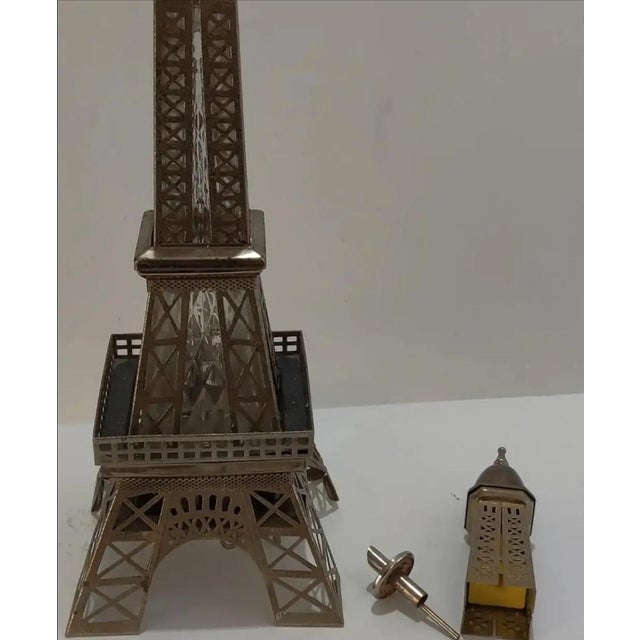 For your consideration. . . A rare vintage musical decanter designed in the form of France's iconic landmark the Eiffel...