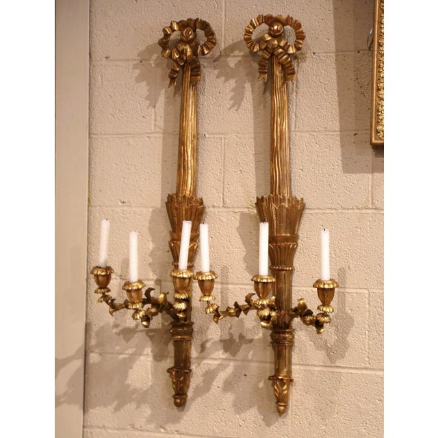 Bring elegant neoclassical style to a living room, dining room, hallway, or bedroom with this impressive pair of French...