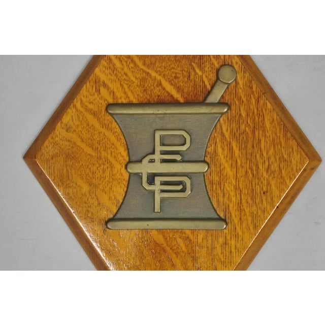 Arts & Crafts Early 20th Century Antique Arts & Crafts Oak Pharmacy Apothecary Bronze Mortar & Pestle Wall Plaque For Sale - Image 3 of 9